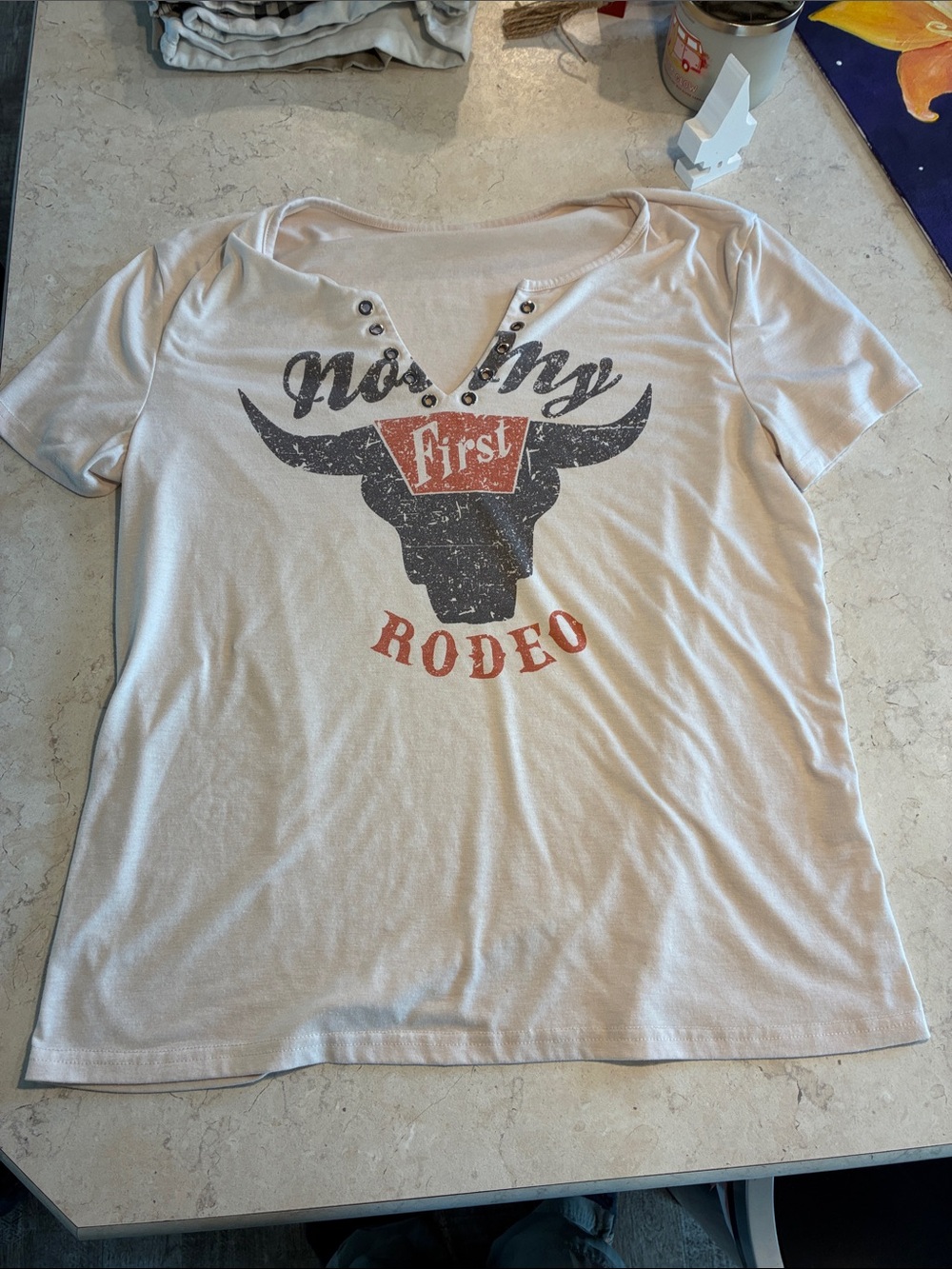 Graphic Not My First Rodeo Bull V-Neck Tee in Cream and Black